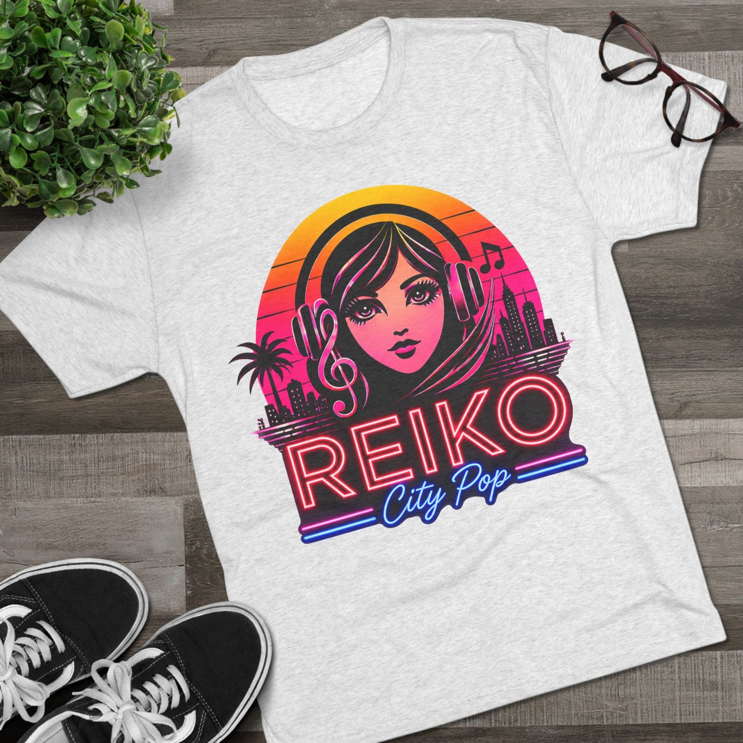 Straight front view of the Reiko Takahashi City Pop Sunset Logo Tee in Heather White, printed on a premium Next Level try-blend T-shirt featuring retro neon artwork inspired by the song "Sunset Road."
